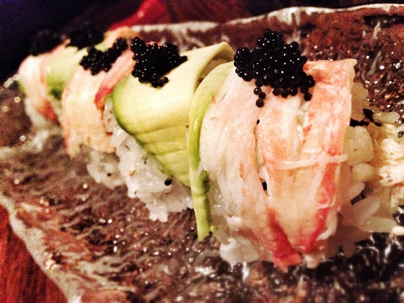 Snow crab wrapped in king crab, avocado and tobiko