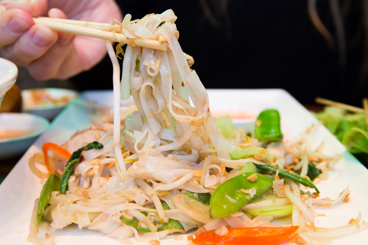 Wok-fried flat noodles with lemongrass