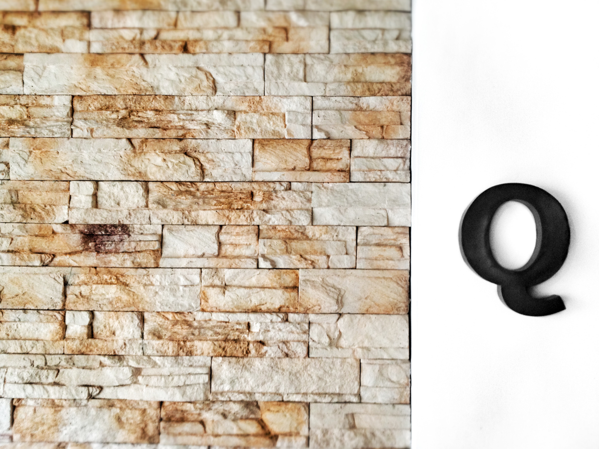 The Q on the wall