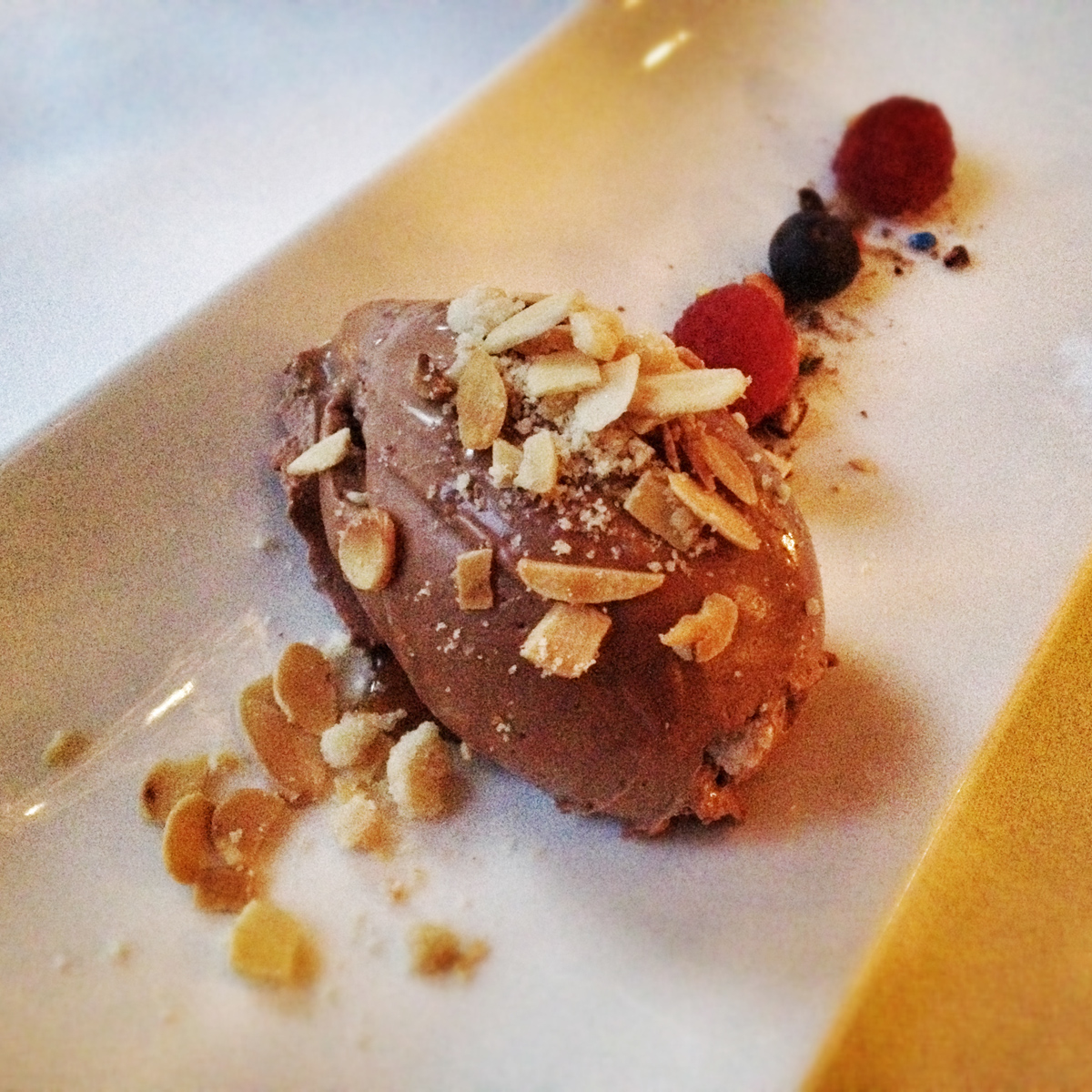 Cremoso mascarpone, chocolate and M&Ms, almond crumble, amaretto and espresso syrup